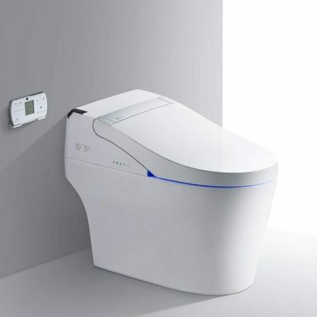 Um banheiro inteligente com bidê embutido e controle remoto estilo painel de controle
