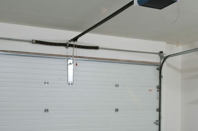 Substituir uma mola da porta da garagem: molas de torção da porta da garagem