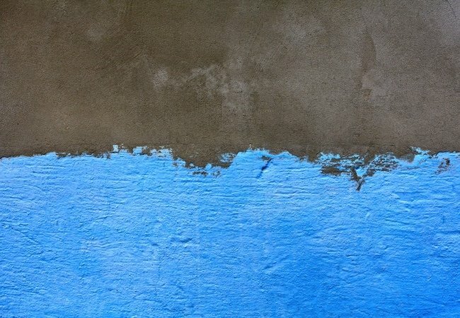 Hogyan távolítsuk el a festéket a betonról