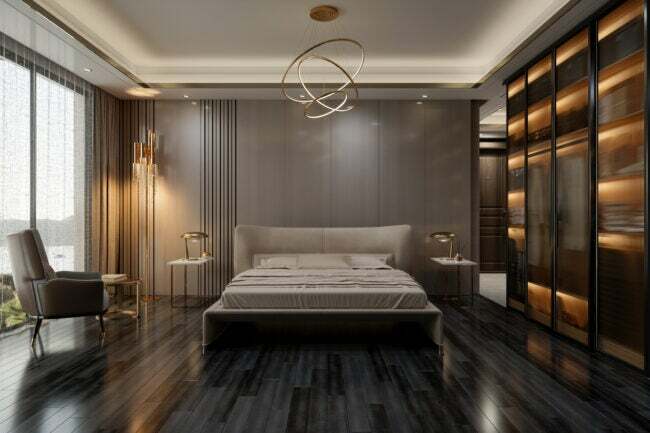 сучасна спальня в бежево-коричневих тонах зі світлодіодним освітленням уздовж ящиків і полиць